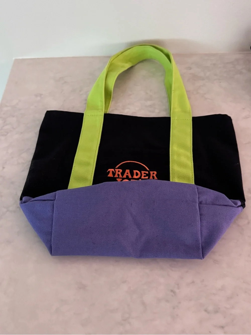 Trader Joe's Black Tote with Lime Handles and Purple Base viral tote
